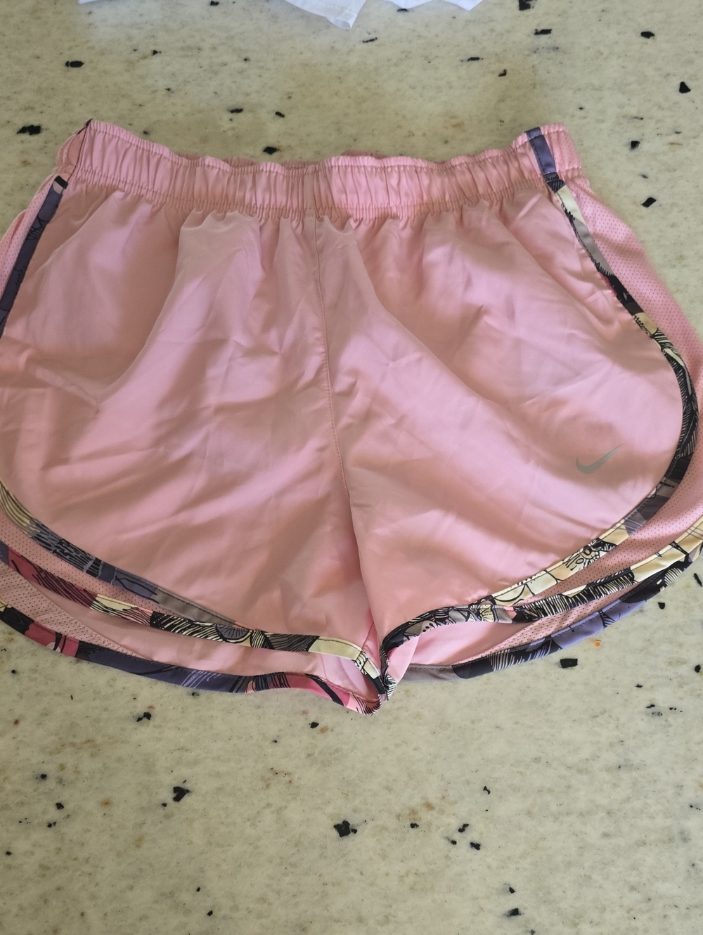 Nike Women’s Light Pink Athletic Shorts with Patterned Trim